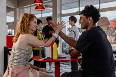 Settling EP 1 (06) Kate Laidler as Young Harry, Kenus Binu as Young Sal (c) 2026 SPP